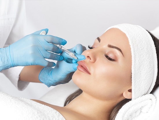 A woman receiving a botox injection in a beauty salon in Vancouver.