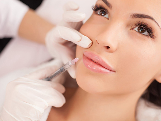 A woman receiving a botox injection at a clinic in Vancouver.